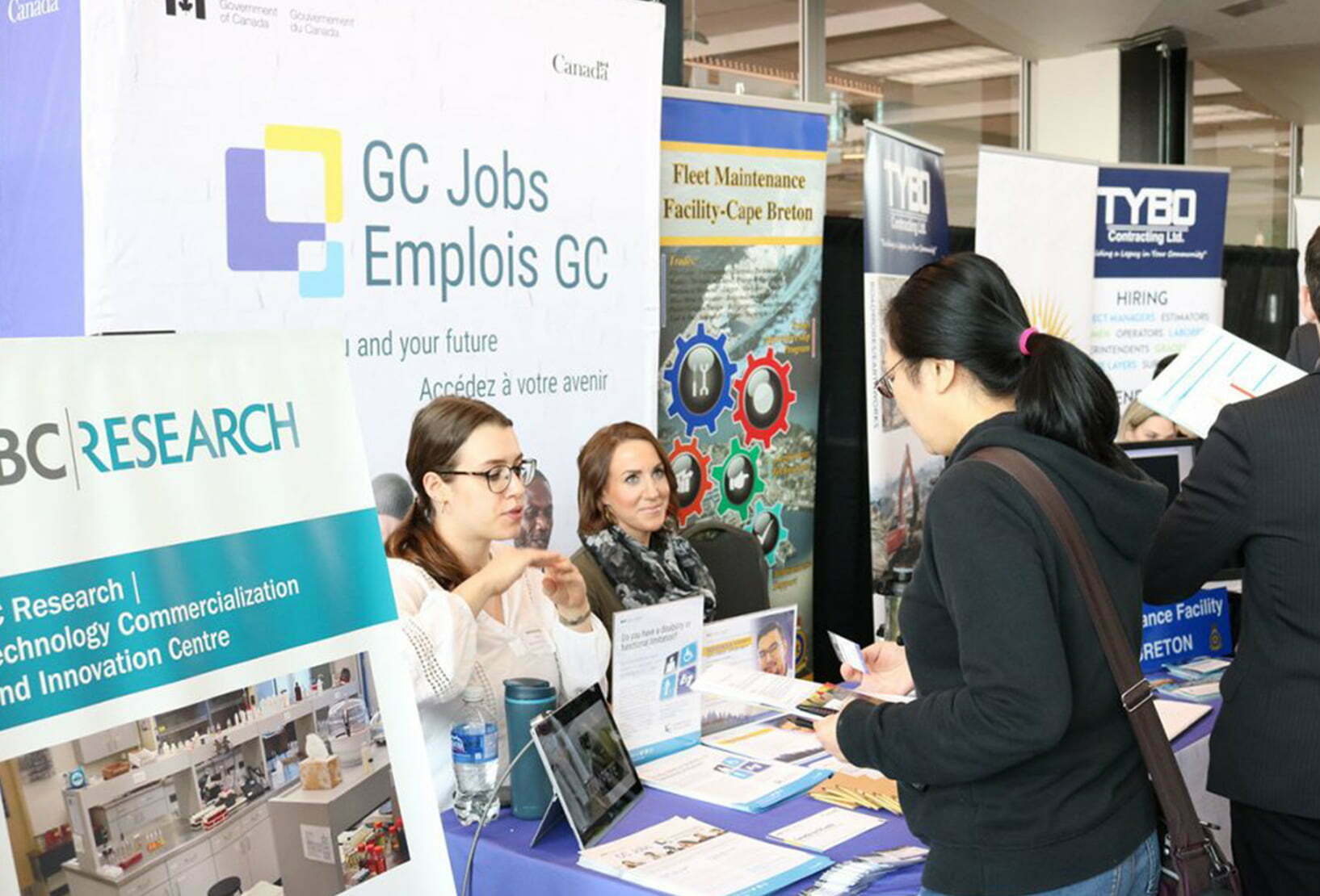student talking to employer